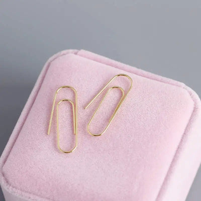 Pamela Posh Paperclip Earrings - A cool, stylish pair of earrings made to look like simple paperclips, but made from beautiful 925 Sterling Silver and 14 karat yellow gold.