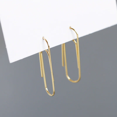 Pamela Posh Paperclip Earrings - A cool, stylish pair of earrings made to look like simple paperclips, but made from beautiful 925 Sterling Silver and 14 karat yellow gold.