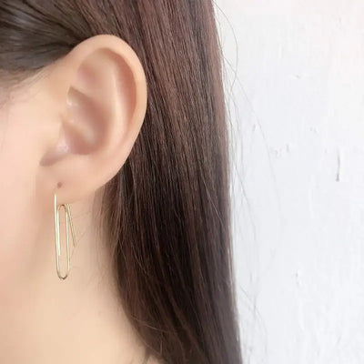 Pamela Posh Paperclip Earrings - A cool, stylish pair of earrings made to look like simple paperclips, but made from beautiful 925 Sterling Silver and 14 karat yellow gold.