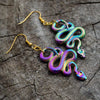Pasiphae Dark Iridescent Snake Drop Earrings - Cute medium-sized snake themed earrings treated with an iridescent substance to give them an oil slick like finish.