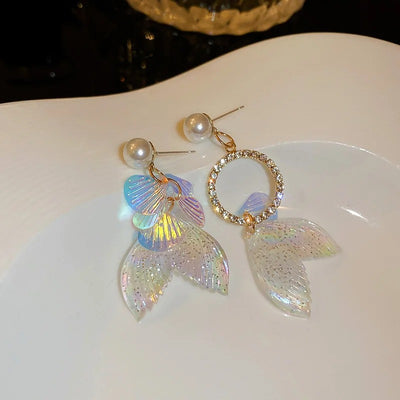 Pearla Iridescent Acrylic Earrings - Lovely lopsided iridescent earrings with a seaside theme, featuring seashells, fish tails, crystals, and pearls.