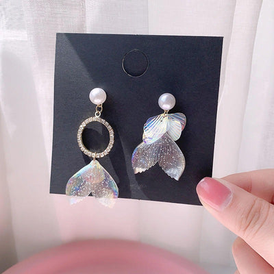 Pearla Iridescent Acrylic Earrings - Lovely lopsided iridescent earrings with a seaside theme, featuring seashells, fish tails, crystals, and pearls.