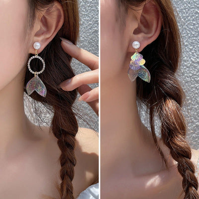 Pearla Iridescent Acrylic Earrings - Lovely lopsided iridescent earrings with a seaside theme, featuring seashells, fish tails, crystals, and pearls.