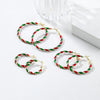 Peppermint Twist Hoop Earrings - Chunky twisted metal hoop earrings with alternating red and green enamel paint, making them look like candy canes.