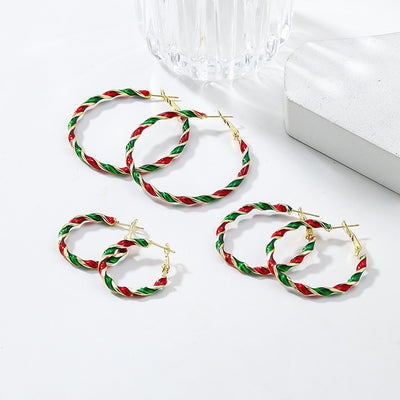 Peppermint Twist Hoop Earrings - Chunky twisted metal hoop earrings with alternating red and green enamel paint, making them look like candy canes.