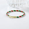 Peppermint Twist Hoop Earrings - Chunky twisted metal hoop earrings with alternating red and green enamel paint, making them look like candy canes.