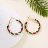 Peppermint Twist Hoop Earrings - Chunky twisted metal hoop earrings with alternating red and green enamel paint, making them look like candy canes.