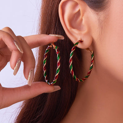 Peppermint Twist Hoop Earrings - Chunky twisted metal hoop earrings with alternating red and green enamel paint, making them look like candy canes.