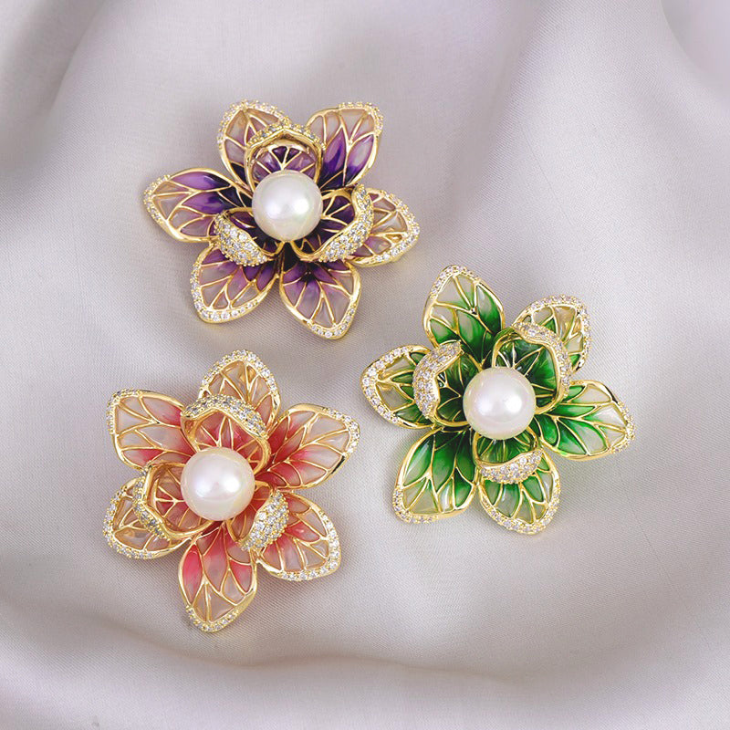 Isabelle Iris Sculpted Resin Brooch - An elegant floral brooch available in green, purple, or salmon pink, with shimmering crystals and semi-translucent resin.