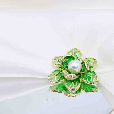 Isabelle Iris Sculpted Resin Brooch - An elegant floral brooch available in green, purple, or salmon pink, with shimmering crystals and semi-translucent resin.