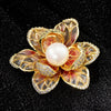 Isabelle Iris Sculpted Resin Brooch - An elegant floral brooch available in green, purple, or salmon pink, with shimmering crystals and semi-translucent resin.