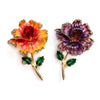 Piper Enamel Primrose Brooch - A detailed floral brooch featuring a large central stone with ruffled enamel petals surrounding it, painted with vibrant enamel paint.