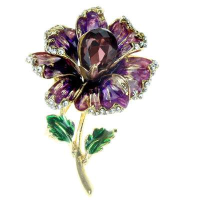 Piper Enamel Primrose Brooch - A detailed floral brooch featuring a large central stone with ruffled enamel petals surrounding it, painted with vibrant enamel paint.