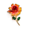 Piper Enamel Primrose Brooch - A detailed floral brooch featuring a large central stone with ruffled enamel petals surrounding it, painted with vibrant enamel paint.