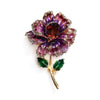 Piper Enamel Primrose Brooch - A detailed floral brooch featuring a large central stone with ruffled enamel petals surrounding it, painted with vibrant enamel paint.