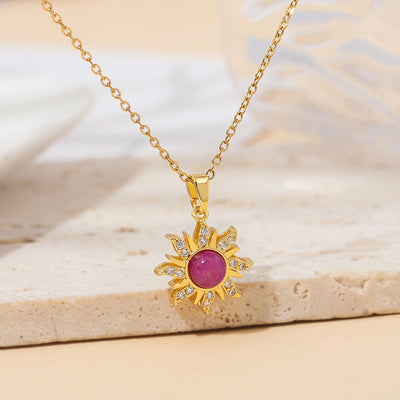 Pretty Pretty Princess Royal Heart & Sun Necklace Set - A delicate jewellery set featuring a matched pair of necklaces with pink crystals and gold-toned metal.