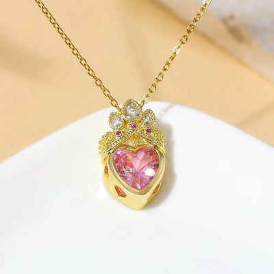 Pretty Pretty Princess Royal Heart & Sun Necklace Set - A delicate jewellery set featuring a matched pair of necklaces with pink crystals and gold-toned metal.