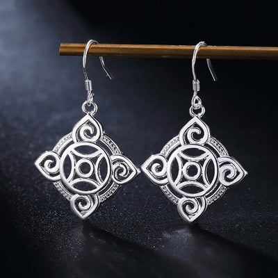 Quetzlali Geometric Drop Earrings - Beautiful silver earrings featuring a cool, unusual geometric motif formed by squares, curves, and spirals.