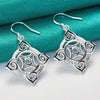 Quetzlali Geometric Drop Earrings - Beautiful silver earrings featuring a cool, unusual geometric motif formed by squares, curves, and spirals.