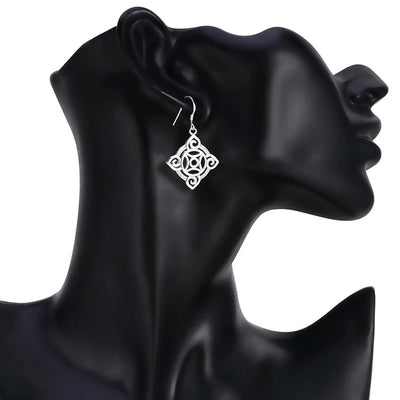 Quetzlali Geometric Drop Earrings - Beautiful silver earrings featuring a cool, unusual geometric motif formed by squares, curves, and spirals.