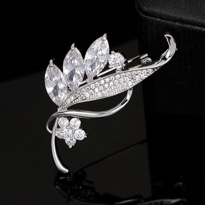 Radiance Luxury Crystal Lily Brooch - A lovely sparkling crystal brooch shaped like a bundle of flowers with leaves wrapped around them.