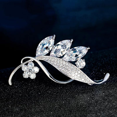 Radiance Luxury Crystal Lily Brooch - A lovely sparkling crystal brooch shaped like a bundle of flowers with leaves wrapped around them.