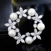 Radiance Luxury Crystal Wreath Brooch - A lovely sparkling crystal brooch shaped like a wreath with stylised flowers and pearls.