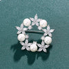 Radiance Luxury Crystal Wreath Brooch - A lovely sparkling crystal brooch shaped like a wreath with stylised flowers and pearls.