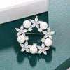 Radiance Luxury Crystal Wreath Brooch - A lovely sparkling crystal brooch shaped like a wreath with stylised flowers and pearls.