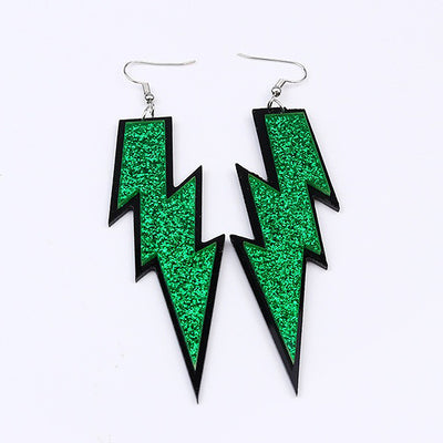 Retro Revival Lightning Strikes Twice Hook Earrings - Large, colourful lightning bolt earrings made from vivid acrylic plastic, with a black background that looks like the outline of a comic book character.