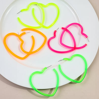 Neon Vibes Oversized Heart Hoop Earrings - Large, chunky heart-shaped acrylic hoop earrings, available in Neon Green, Orange, Pink, or Yellow.