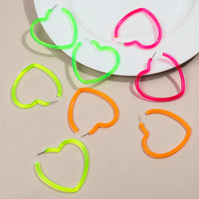 Neon Vibes Oversized Heart Hoop Earrings - Large, chunky heart-shaped acrylic hoop earrings, available in Neon Green, Orange, Pink, or Yellow.