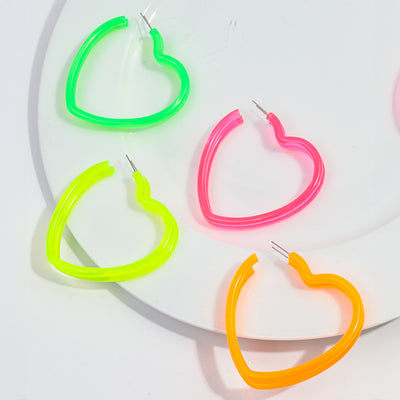 Neon Vibes Oversized Heart Hoop Earrings - Large, chunky heart-shaped acrylic hoop earrings, available in Neon Green, Orange, Pink, or Yellow.