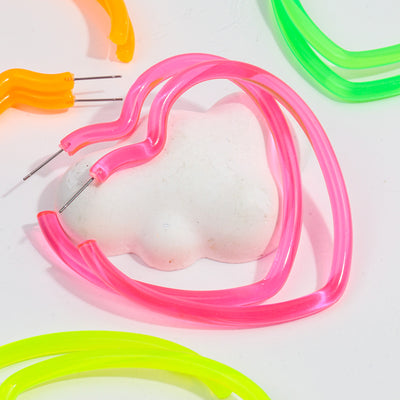 Neon Vibes Oversized Heart Hoop Earrings - Large, chunky heart-shaped acrylic hoop earrings, available in Neon Green, Orange, Pink, or Yellow.