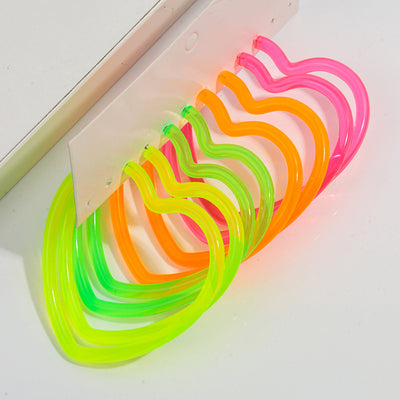 Neon Vibes Oversized Heart Hoop Earrings - Large, chunky heart-shaped acrylic hoop earrings, available in Neon Green, Orange, Pink, or Yellow.