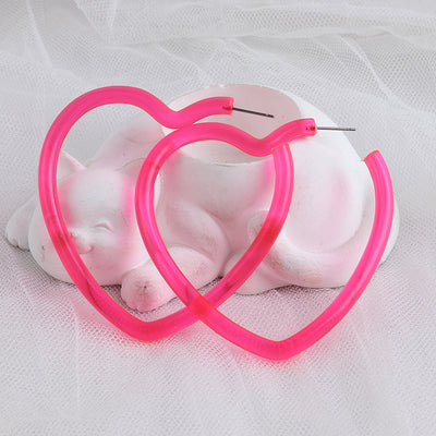 Neon Vibes Oversized Heart Hoop Earrings - Large, chunky heart-shaped acrylic hoop earrings, available in Neon Green, Orange, Pink, or Yellow.