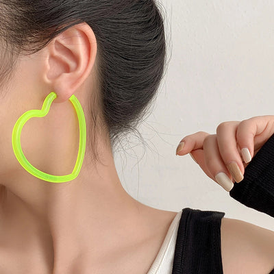 Neon Vibes Oversized Heart Hoop Earrings - Large, chunky heart-shaped acrylic hoop earrings, available in Neon Green, Orange, Pink, or Yellow.