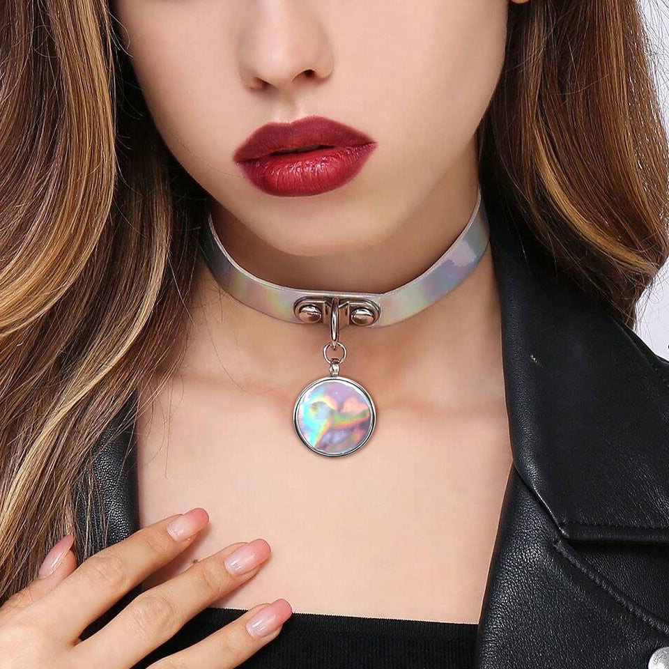 Retro Revival - Trinity Holographic Chokers - Disc Charm - A close-fitting choker necklace made of holographic/laser artificial leather, with a round coin-shaped charm suspended from a buckle in the front.