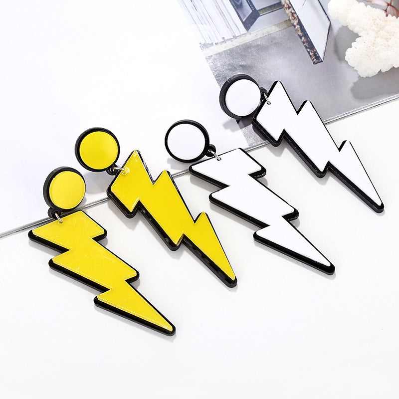 Retro Revival Zippity-Zap Lightning Bolt Earrings - Stylised cartoon earrings made of acrylic formed to resemble a lightning bolt, available in yellow or white. 