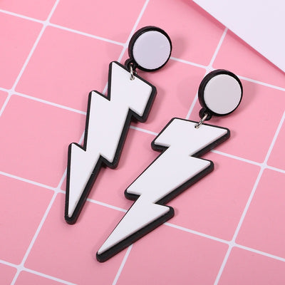 Retro Revival Zippity-Zap Lightning Bolt Earrings - Stylised cartoon earrings made of acrylic formed to resemble a lightning bolt, available in yellow or white.