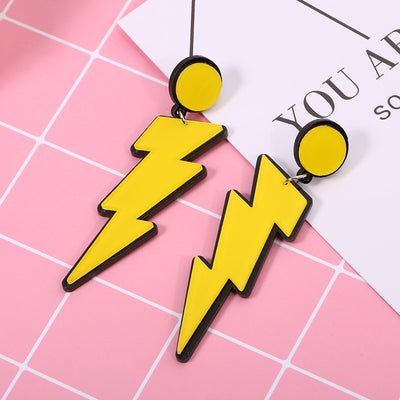 Retro Revival Zippity-Zap Lightning Bolt Earrings - Stylised cartoon earrings made of acrylic formed to resemble a lightning bolt, available in yellow or white.