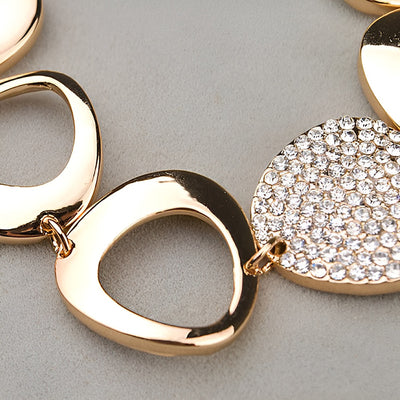 Reuleaux Link Bracelet - An unusual and elegant gold bracelet with large asymmetrical shapes and artificial crystals.