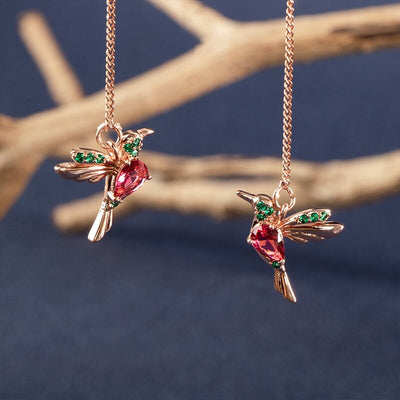 Rhiannon Hummingbird Threader Earrings - Tiny bird-shaped charms adorned with colourful crystals, attached to a long threader earring chain.