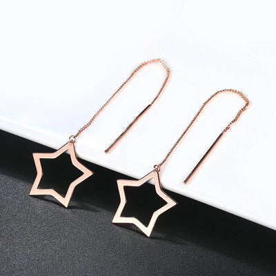 Rihanna Superstar Threader Earrings - A simple five-pointed hollow star attached to a long threader chain.