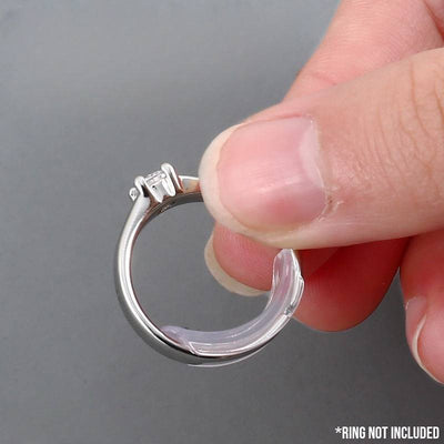 Ring Size Adjuster - 8 Piece Clip-On Set - A set of flexible silicone pads designed to be slipped inside the band of a ring to make it fit a little closer to the wearer's finger.