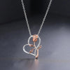 Rosalie Rosebud Heart Necklace - An elegant floral-themed necklace featuring a platinum plated heart with a beautiful rose gold rose, and sparkling crystals.