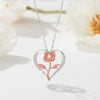 Rosalie Rosebud Heart Necklace - An elegant floral-themed necklace featuring a platinum plated heart with a beautiful rose gold rose, and sparkling crystals.