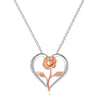 Rosalie Rosebud Heart Necklace - An elegant floral-themed necklace featuring a platinum plated heart with a beautiful rose gold rose, and sparkling crystals.