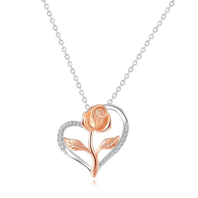 Rosalie Rosebud Heart Necklace - An elegant floral-themed necklace featuring a platinum plated heart with a beautiful rose gold rose, and sparkling crystals.