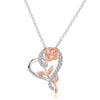 Rosalie Rosebud Heart Necklace - An elegant floral-themed necklace featuring a platinum plated heart with a beautiful rose gold rose, and sparkling crystals.